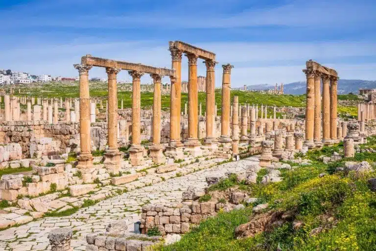 Exploring the ancient ruins of Jerash, Jordan with columns and arches