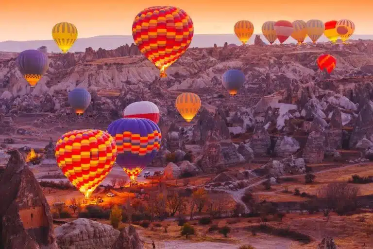 Balloon flight over the unique rock formations of Cappadocia, with a view of the Goreme National Park, starting from Istanbul.