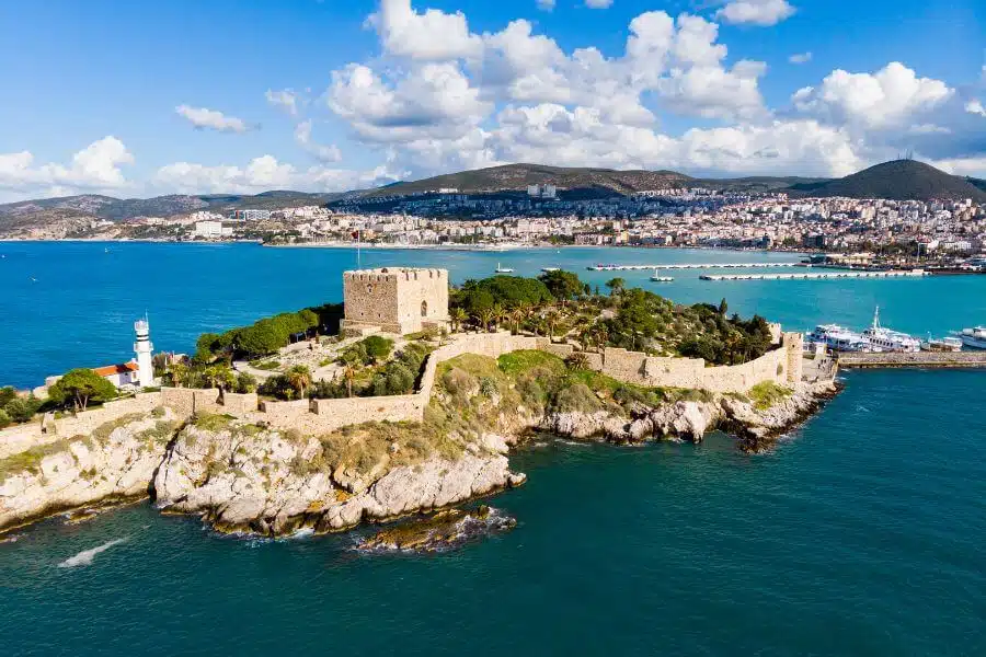 Aerial view of Pigeon Island in Kusadasi, Turkey, showcasing its natural beauty and surrounding turquoise waters.